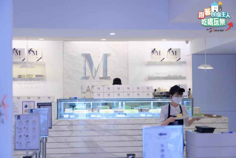 Lady M 主題牆左上角品牌標誌與 NEW YORK 字樣